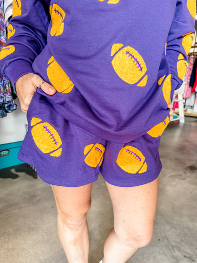 Why Dress Purple and Gold Football Shorts