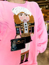 QOS Pink Blonde-Haired Shopping Nutcracker Sweatshirt