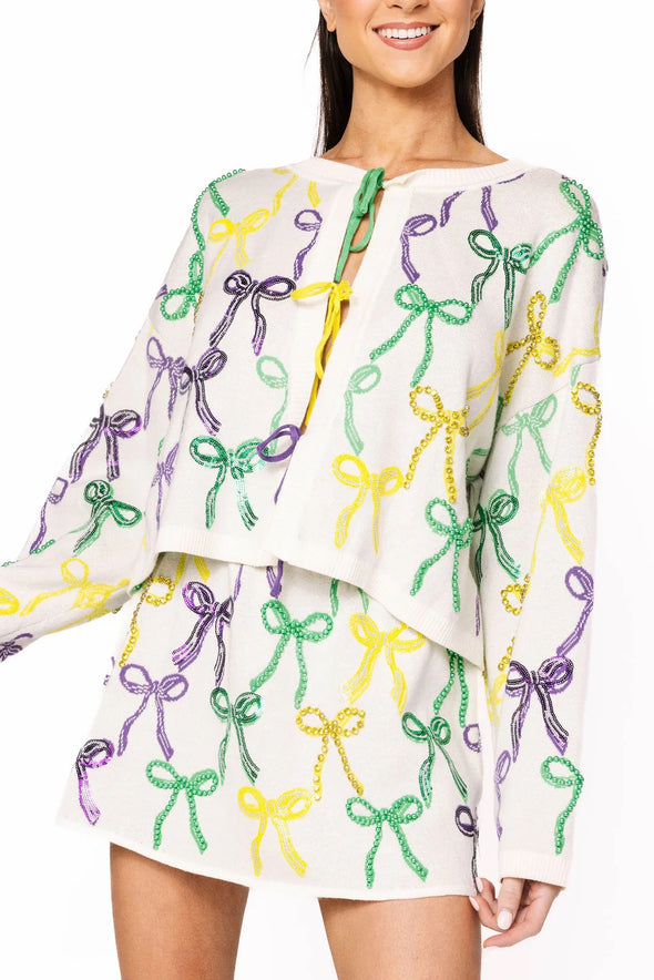 QOS White Mardi Gras Bow Tie Up Sweater